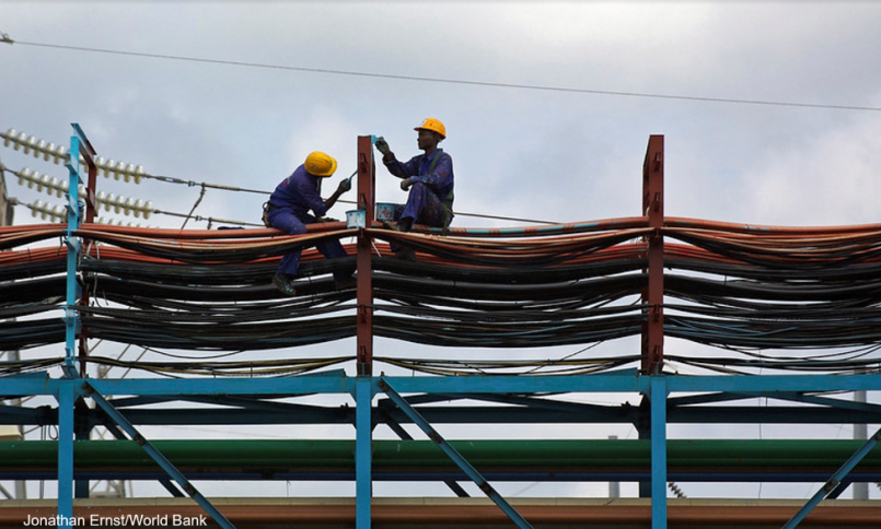 Workers on thermal plant in Ghana