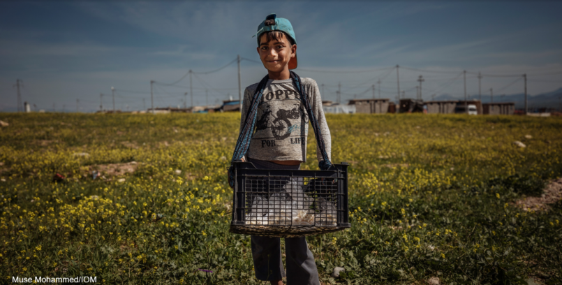IDP Iraqi boy selling popcorn