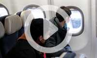 Afghan refugees arrive on a flight from Tajikistan