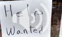 Help Wanted sign offers employment in a restaurant in Bethesda, Maryland